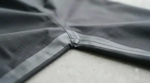 Ankle zippers on rain pants allowing for easy wear over hiking boots.