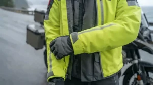 Breathable motorcycle rain jacket with ventilation for comfort.