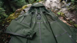 Adjustable hood on a rain poncho for hiking in windy conditions.