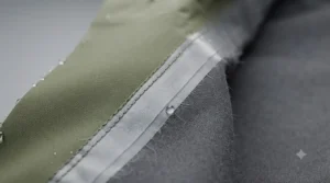 Heat-sealed taped seams on men's 2-piece rain suit for maximum water resistance.