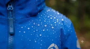 Close-up of a top rated 3-in-1 jacket for kids showing waterproof outer shell fabric suitable for rainy Canadian autumn days.