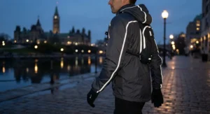 Detailed view of reflective safety piping on an all-season 3-in-1 jacket during an evening walk in Ottawa.