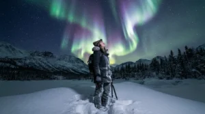 Standing outdoors under the aurora borealis in -40°C rated winter boots.